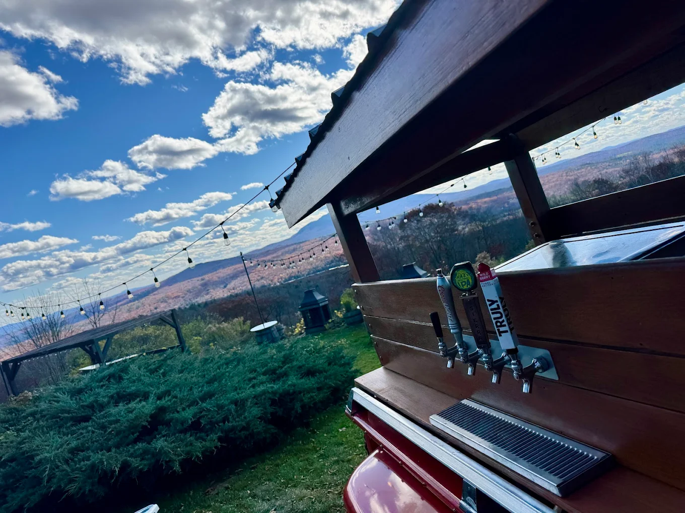 Vintage Cocktail mobile bar setup at a stunning outdoor New Hampshire venue with mountain views